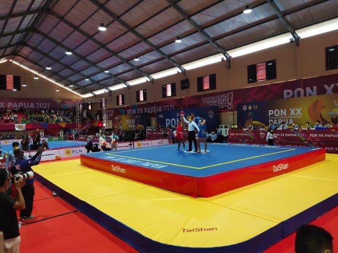 adi_manurung_atlet_wushu_toba_lolos_ke_final_pon_xx_papua