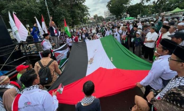 aksi_bela_palestina_diprediksi_berlangsung_lama_di_indonesia_warga_as_diminta_waspada
