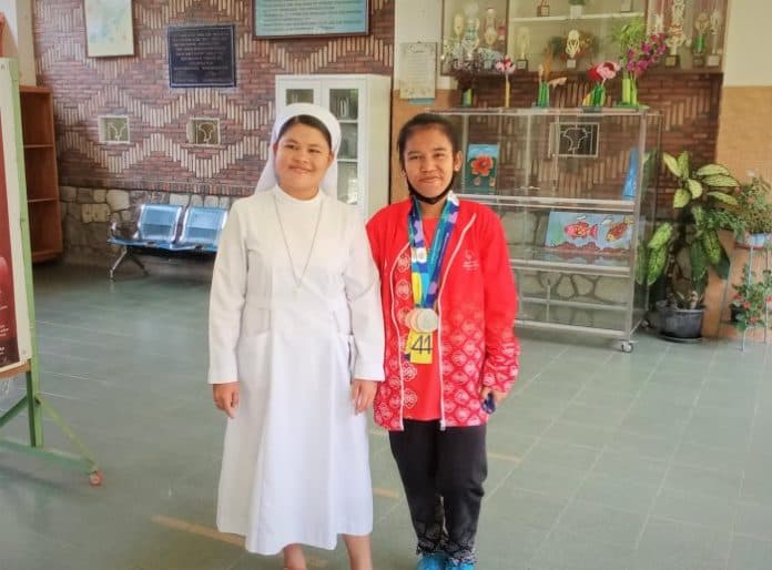 atlet_disabilitas_cyntia_nainggolan_mendapat_tiga_medali_di_olimpiade_musim_panas_spesifik_2023_di_jerman