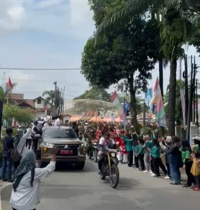 atlet_lari_tni_polri_antar_api_pon_xxi_ke_lubuk_pakam