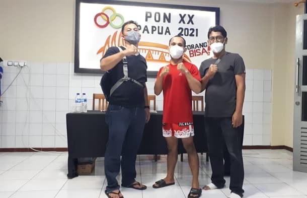 atlet_wushu_toba_adi_manurung_lolos_ke_semifinal_pon_xx_papua