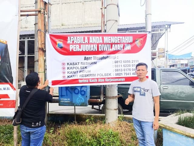 berantas_perjudian_sat_reskrim_polres_batu_bara_pasang_spanduk_nomor_pengaduan