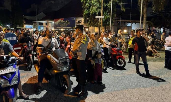 berlangsung_kondusif_polres_tanjung_balai_pengamanan_malam_takbiran_idul_adha_1445_h