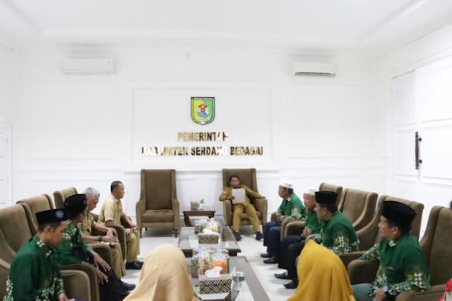 bupati_darma_wijaya_terima_kunjungan_pt_bank_mandiri_taspen_dan_pd_muhammadiyah_sergai