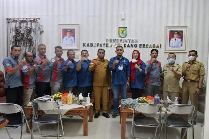 bupati_sergai_dukung_rapimwil_iwo_sumut_di_theme_park_pantai_cermin