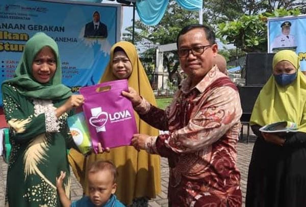 cegah_anemia_dan_stunting_pemko_tebing_tinggi_gelar_kegiatan_makan_ikan_di_kantor_camat