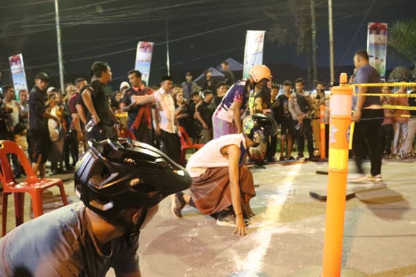 cegah_balap_liar_polres_tanjung_balai_gelar_lomba_unik_balap_lari_mendadak_atlet