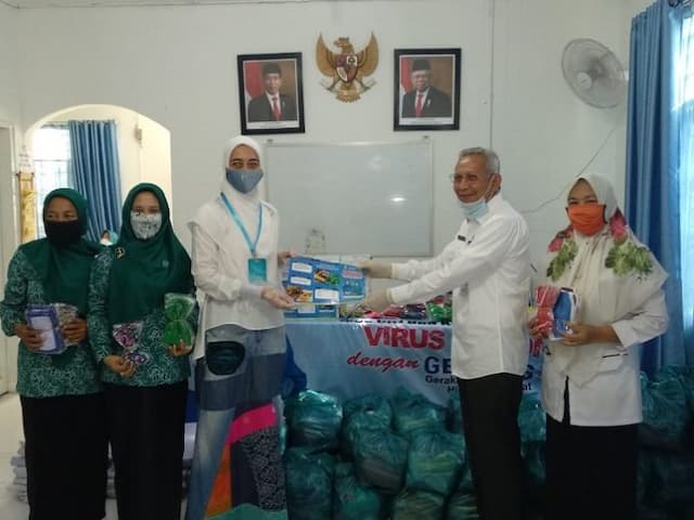 cegah_penyebaran_covid_19_dinkes_batu_bara_hibahkan_apd_ke_tp_pkk_batu_bara