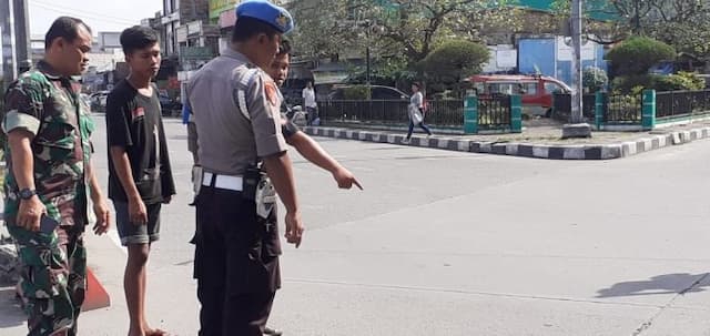 diduga_depresi_oknum_polisi_lompat_dari_fly_over_jamin_ginting