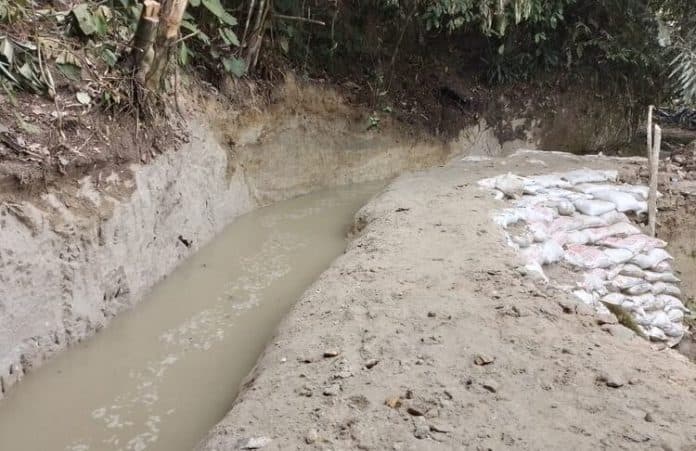 diperbaiki_2_pekan_saluran_irigasi_di_nagori_sipoldas_kini_dialiri_air