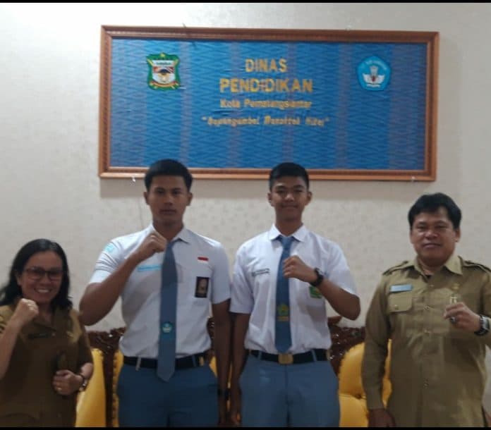 disdik_siantar_melepas_2_pelajar_jadi_paskibraka_provinsi_di_upacara_hari_sumpah_pemuda