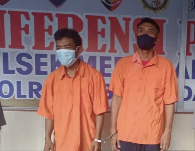 dua_perampok_toko_susu_di_medan_dibekuk_enam_orang_lagi_diburu