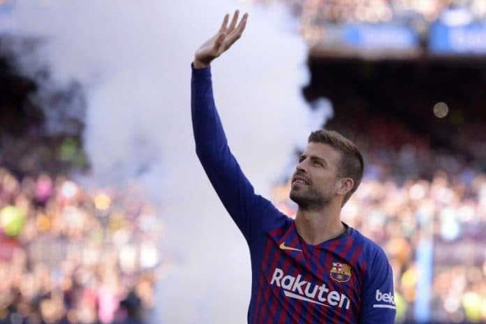 gerard_pique_gantung_sepatu