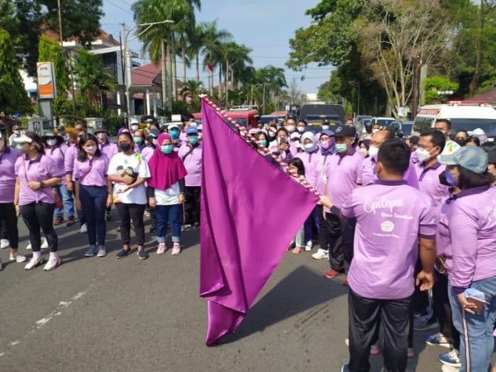 hari_epilepsi_sedunia_pardossi_cabang_medan_gelar_jalan_santai_di_siantar