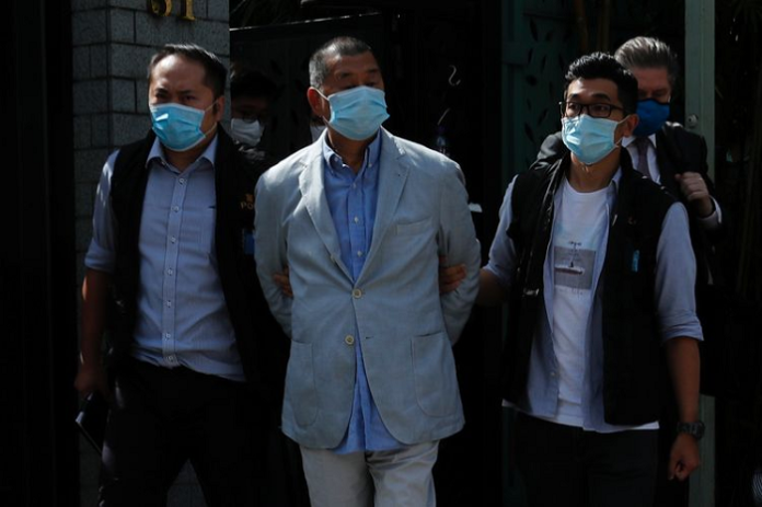 ikut_demo_ilegal_bos_media_hong_kong_dipenjara_12_bulan