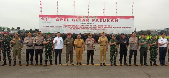iriana_jokowi_dan_wury_maruf_amin_hadiri_hut_dekranas_dan_hkg_pkk_di_medan_polda_sumut_dan_forkopimda_gelar_pasukan