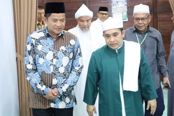 jelang_haul_tuan_guru_babussalam_langkat_pj_gubsu_pastikan_infrastruktur_ke_kampung_religi_baik