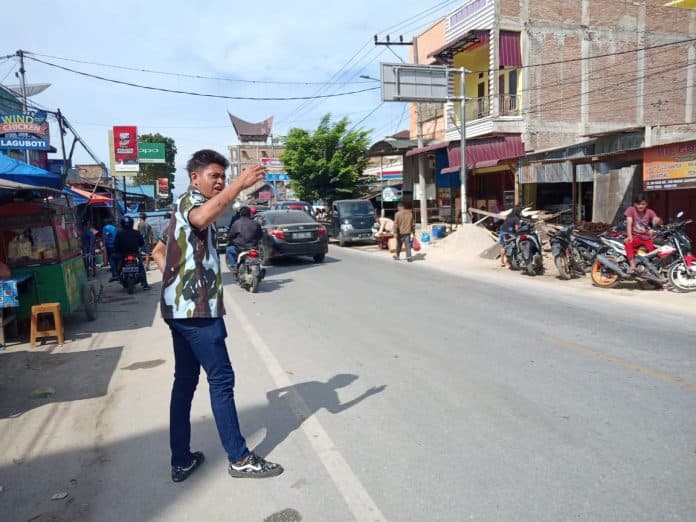kader_ipk_bantu_urai_kemacetan_di_pasar_laguboti