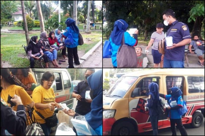 kasus_covid_19_meningkat_karang_taruna_siantar_bagi_bagi_masker