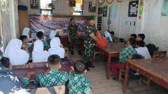 kodim_0212ts_uji_coba_makan_bergizi_gratis_pada_murid_sd