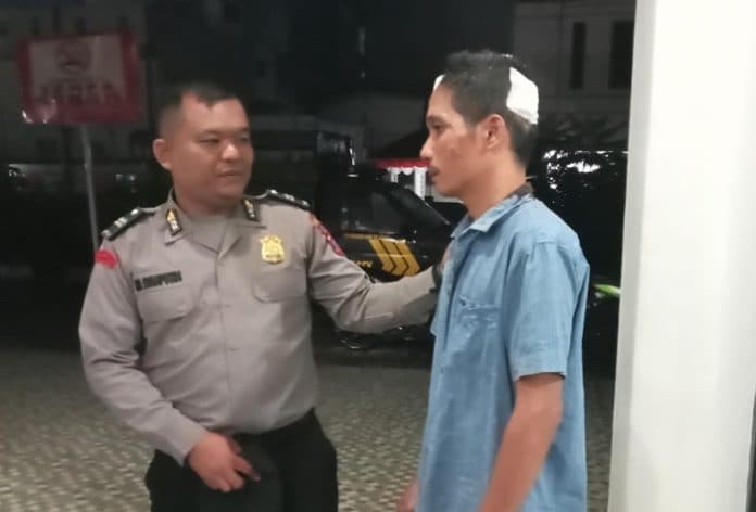 lerai_perkelahian_sesama_jukir_kepala_pria_ini_ditikam_dan_digancu_di_siantar