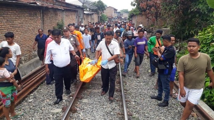lesdin_purba_ditemukan_tak_bernyawa_di_pinggir_rel_jalan_patuan_anggi_siantar