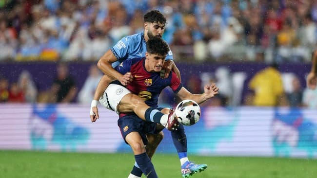 lewat_adu_penalti_barcelona_unggul_4_1_atas_manchester_city