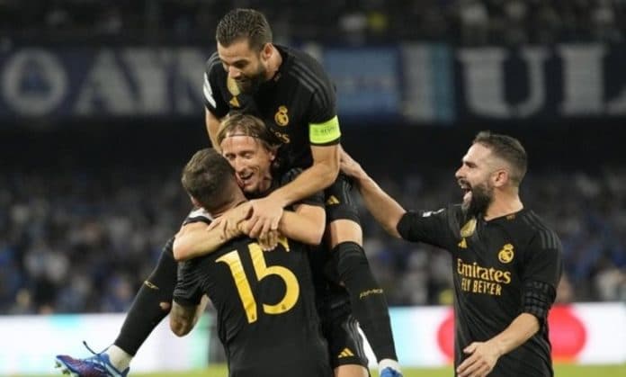 liga_champions_2023_mu_telan_kekalahan_kedua_real_madrid_petik_hasil_manis