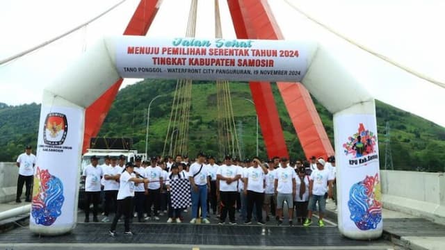 menjelang_pilkada_kpu_samosir_bersama_stakeholder_ikuti_jalan_sehat