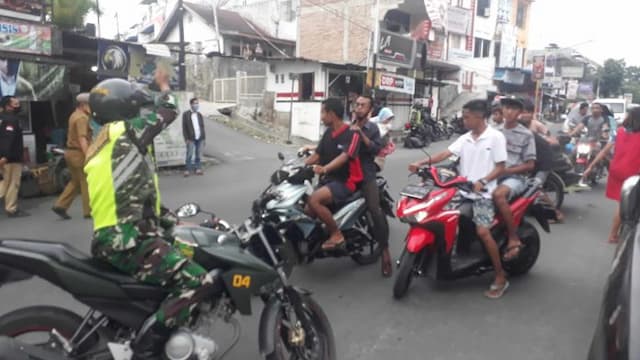 operasi_gabungan_di_siantar_babinsa_minta_pengendara_tak_pakai_masker_putar_haluan