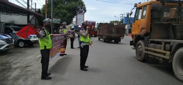 operasi_zebra_toba_2022_sat_lantas_polres_tebing_tinggi_edukasi_warga