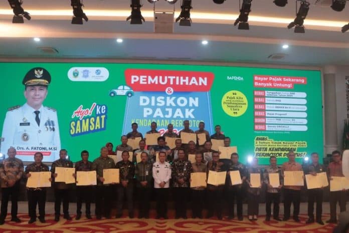 optimalkan_pemungutan_pajak_dan_opsen_pemkab_sergai_teken_pks_dengan_pemprov_sumut