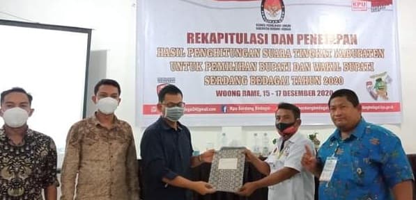 pasangan_darma_wijaya_dan_adlin_tambunan_menang_telak_di_17_kecamatan