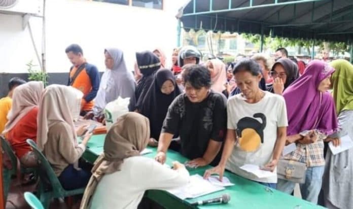 pemko_tebing_tinggi_salurkan_bantuan_pangan_tahap_ii_bagi_12262_orang_pbp