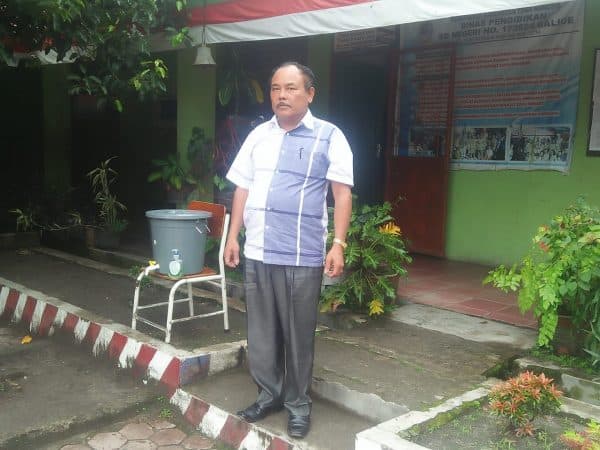 penerimaan_rapor_siswa_terapkan_prokes_di_toba