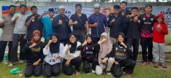 perguruan_silat_kombinasi_cimande_tebing_tinggi_ikuti_launching_maskot_pon_xxi