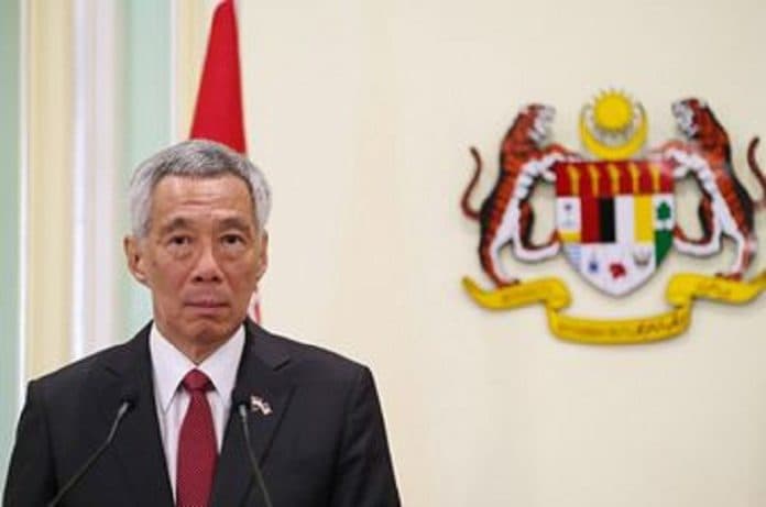 perlambat_penyebaran_covid_19_singapura_akan_menutup_sekolah_dan_sebagian_tempat_kerja