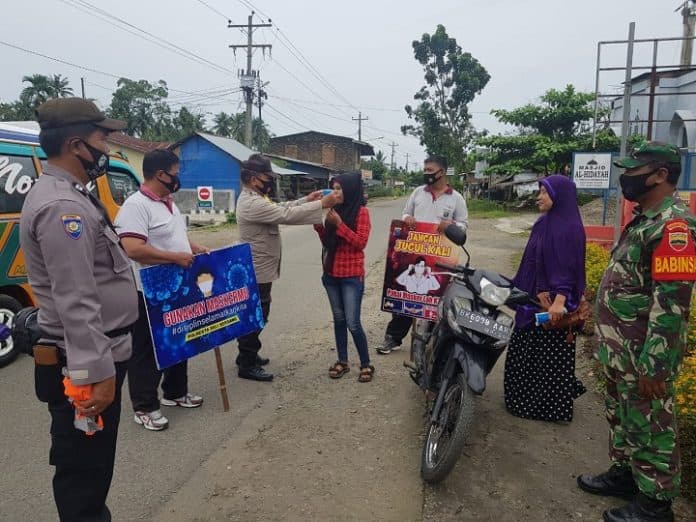 personil_intelkam_polres_deli_serdang_pergoki_warung_langgar_prokes