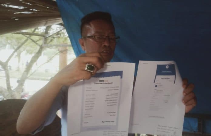 pihak_daus_tunjukkan_bukti_transfer_rp5_juta_ke_oknum_wartawan_di_pancur_batu