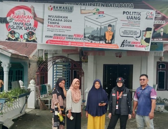 pilkada_2024_bawaslu_batu_bara_pasang_spanduk_guna_tingkatkan_pengawasan_partisipatif