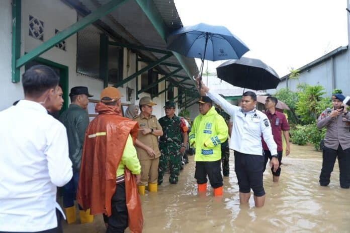 pilkada_di_medan_dikepung_banjir_kapolda_sumut_utamakan_keselamatan_warga