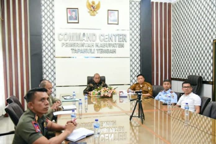 pj_bupati_tapteng_laporkan_ke_gubsu_situasi_politik_di_wilayahnya_tidak_baik_baik_saja