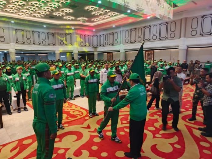 pj_gubsu_kukuhkan_dan_lepas_atlet_yang_bertanding_di_pon_xxi