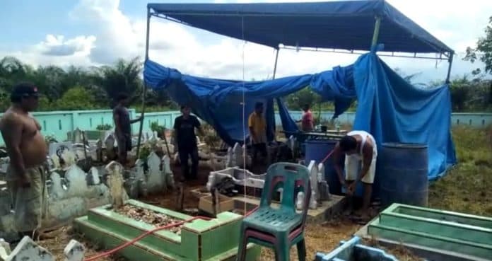 polda_sumut_bongkar_kuburan_korban_kerangkeng_bupati_langkat_nonaktif_di_salapian
