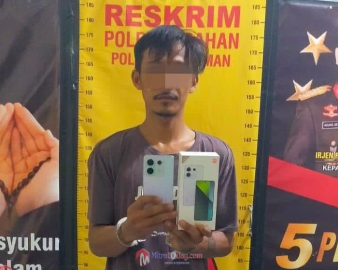 polsek_air_joman_asahan_ringkus_pencuri_hp_di_desa_banjar
