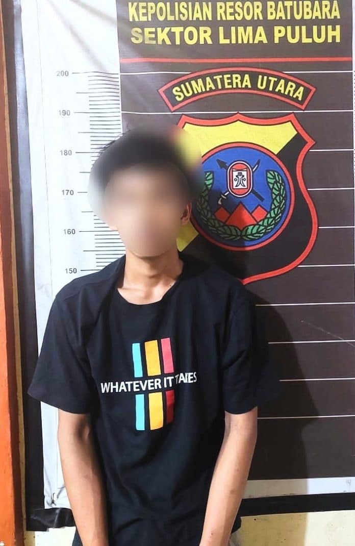 polsek_lima_puluh_amankan_tersangka_penganiaya_warga