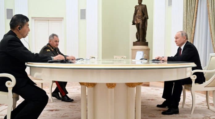 putin_bertemu_menteri_pertahanan_china_kedua_belah_pihak_memuji_kerja_sama_militer