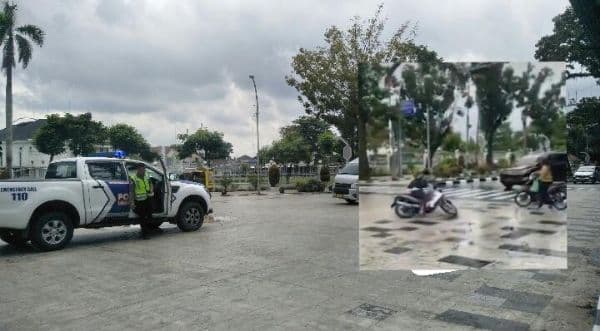 rawan_licin_setelah_direkonstruksi_jalan_sudirman_kini_dijaga_polisi
