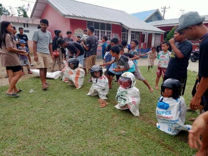 rayakan_kemerdekaan_warga_nagori_sipoldas_dasma_simalungun_gelar_perlombaan_unik