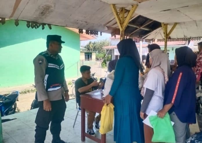 ribuan_kpm_di_kecamatan_dolok_merawan_sergai_terima_bantuan_beras_bulog_10_kilogram